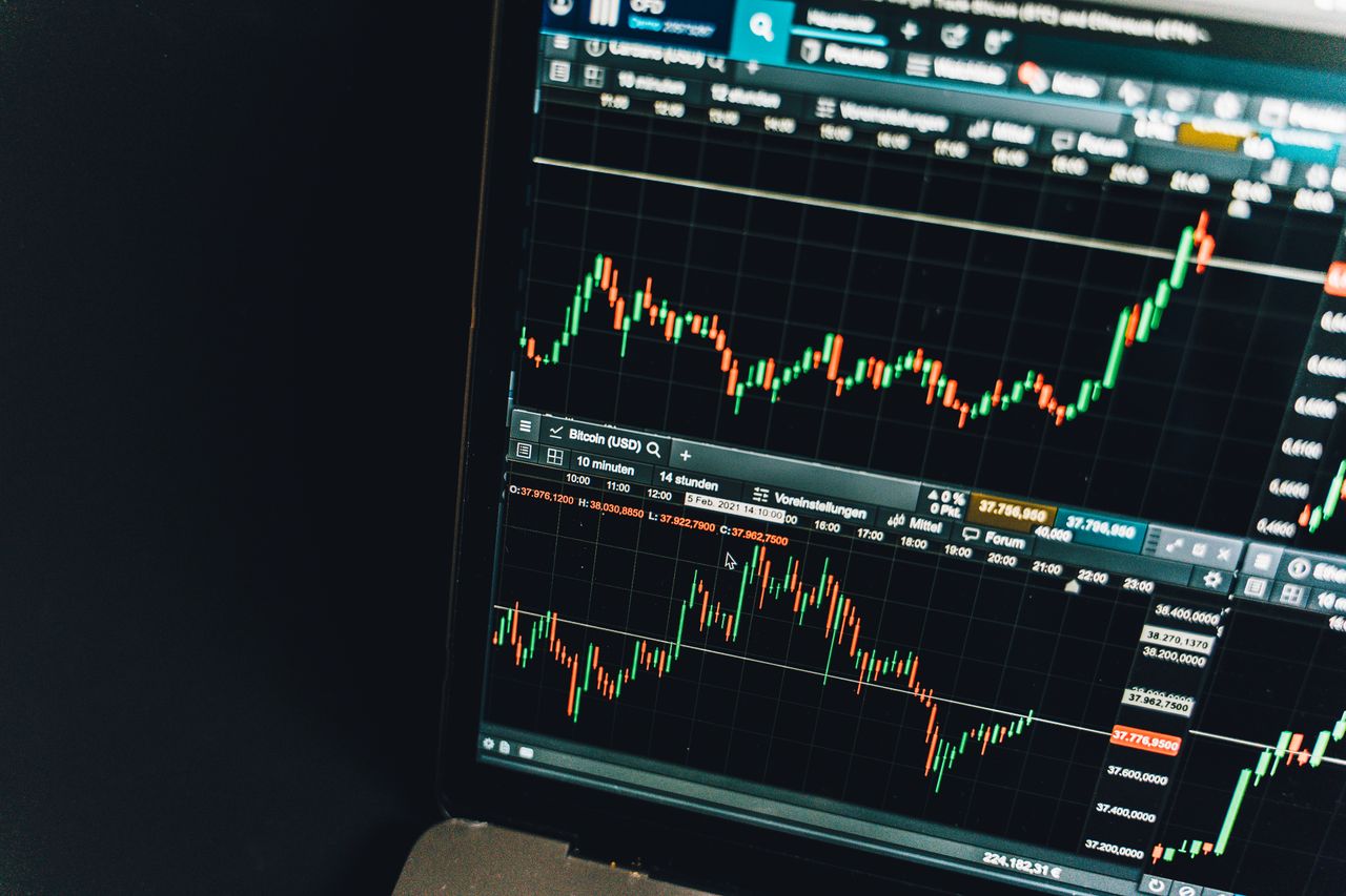 services-02 Close-up of a live cryptocurrency trading chart screen displaying dynamic market trends and analysis.